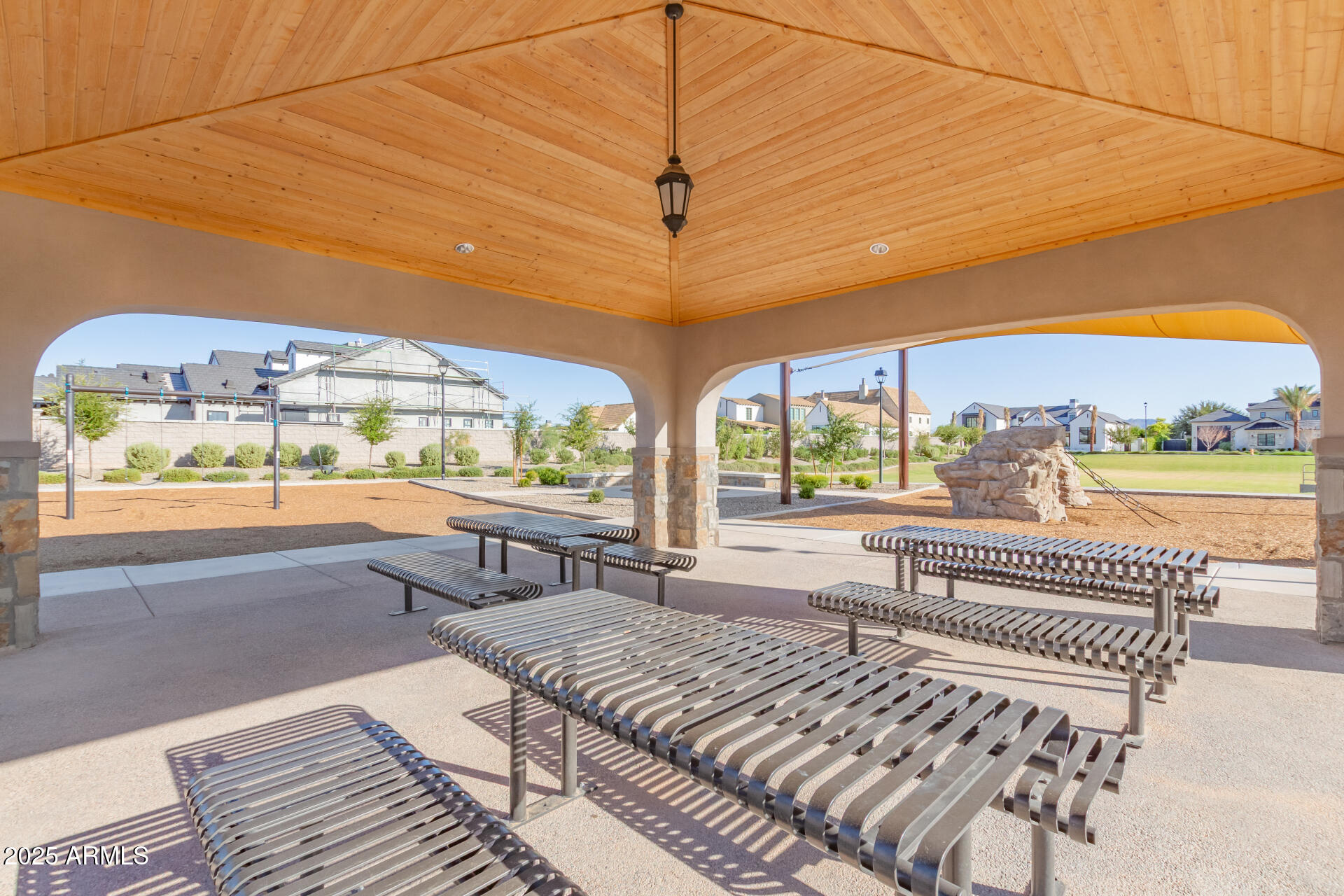 2714 East Blue Sage Road, Unit 128 Gilbert, AZ 85297 - Photo 15 of 18 a balcony with furniture and a large window