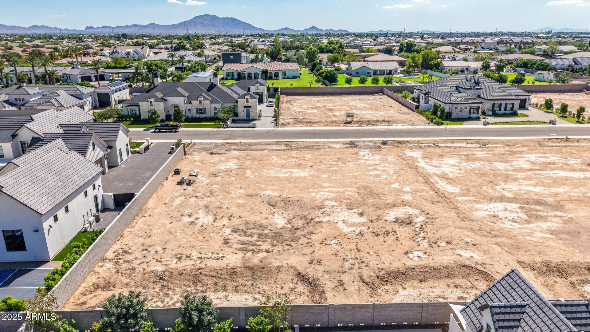 2714 East Blue Sage Road, Unit 128 Gilbert, AZ 85297 - Photo 3 of 18 an aerial view of a city