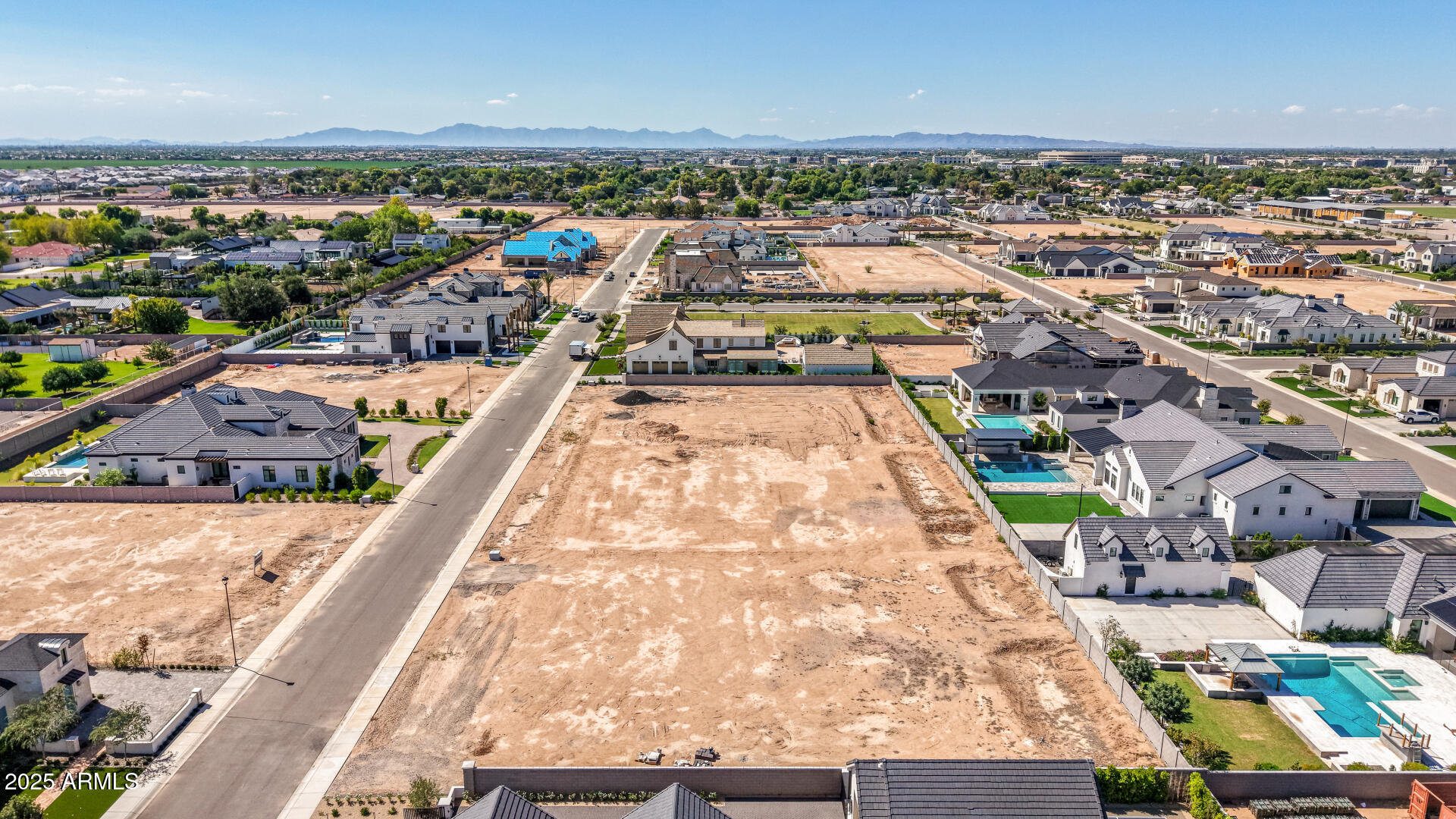 2714 East Blue Sage Road, Unit 128 Gilbert, AZ 85297 - Photo 8 of 18 an aerial view of a city