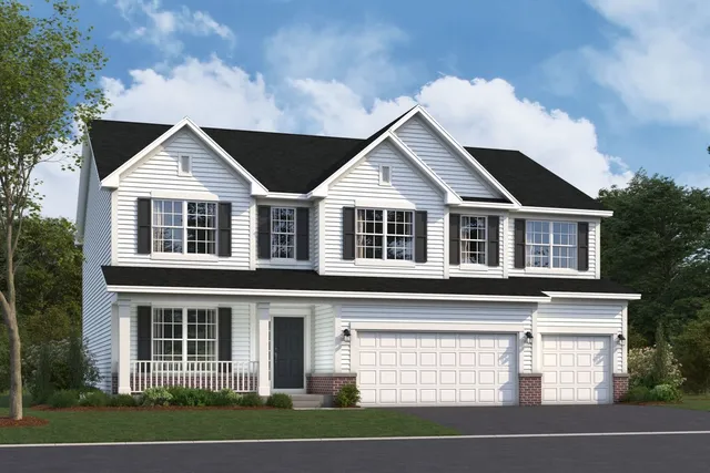 a view of a house with a yard and large trees