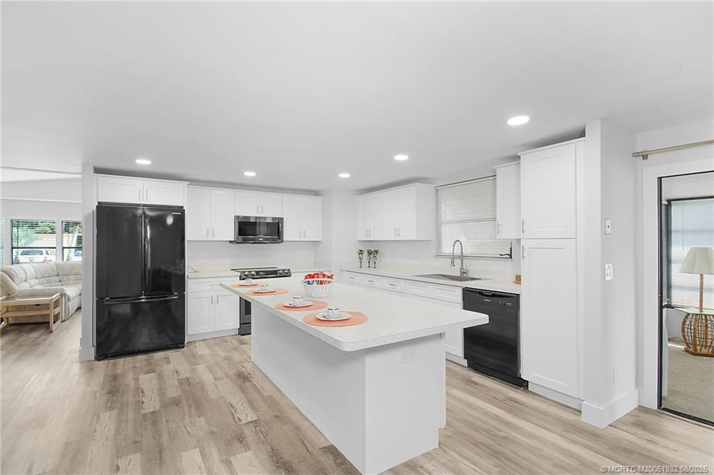 2800 Southwest Toronado Trail Stuart, FL 34997 - Photo 7 of 32 New cabinets, counters, LED lighting & more