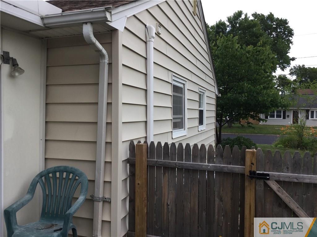 33 Idlewild Road Edison, NJ 08817 - Photo 11 of 16 a view of balcony with wooden deck