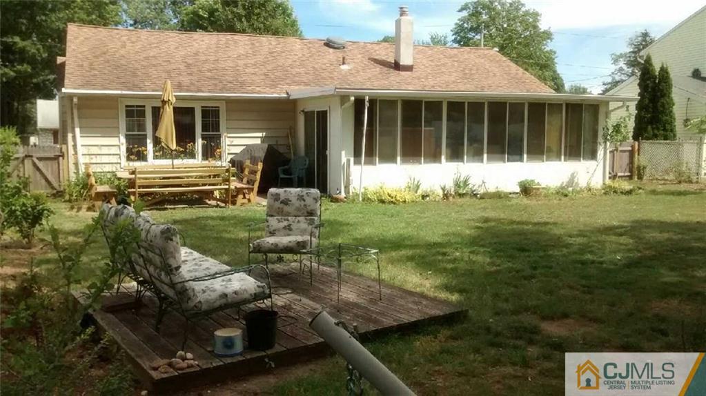 33 Idlewild Road Edison, NJ 08817 - Photo 16 of 16 a view of a house with backyard porch and sitting area