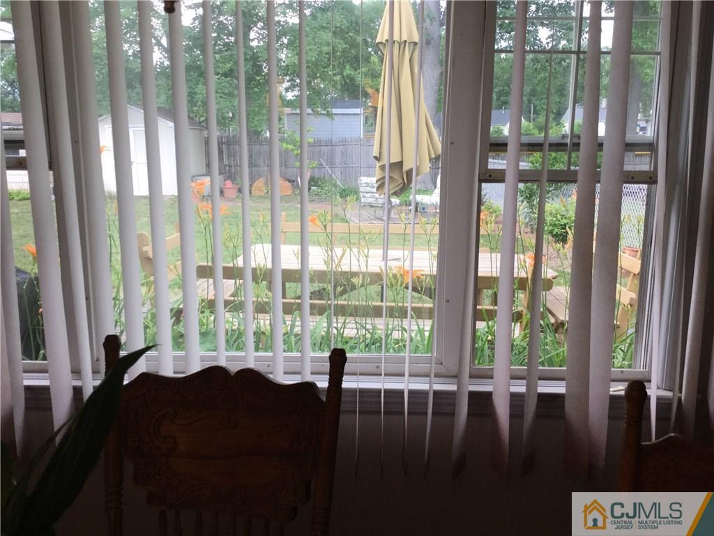 33 Idlewild Road Edison, NJ 08817 - Photo 8 of 16 a floor to ceiling window with outside view
