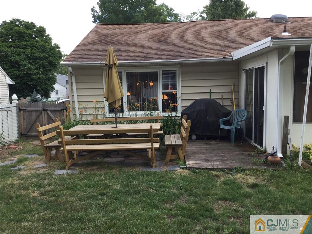 33 Idlewild Road Edison, NJ 08817 - Photo 9 of 16 a view of house and patio with a yard