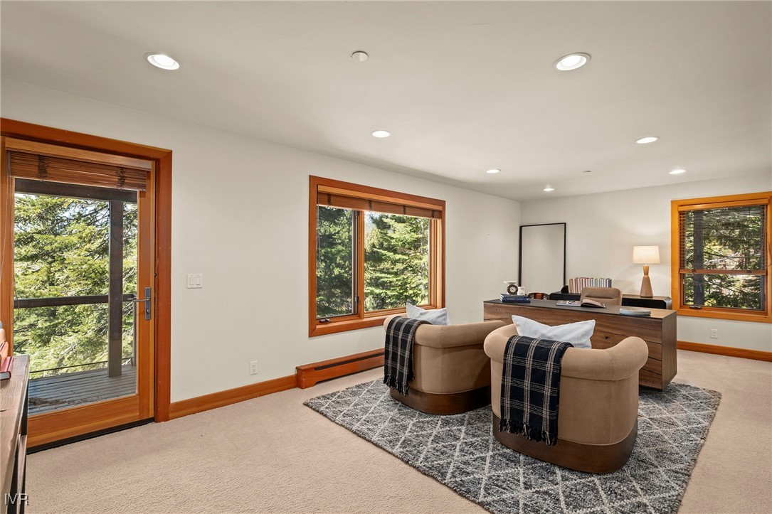 577 Eagle Drive Incline Village, NV 89451 - Photo 32 of 50 a living room with furniture large window and wooden floor
