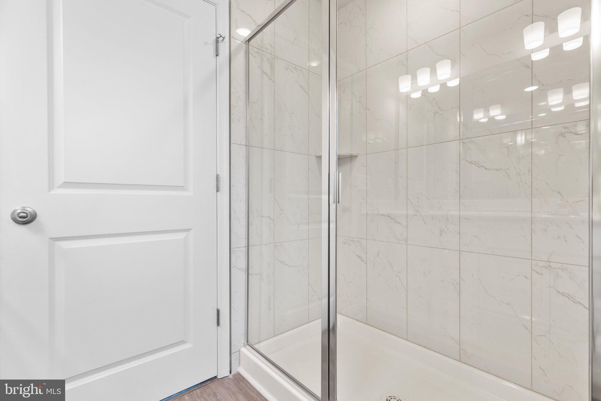 10 Azalea Way Colonial Beach, VA 22443 - Photo 13 of 36 a bathroom with a shower