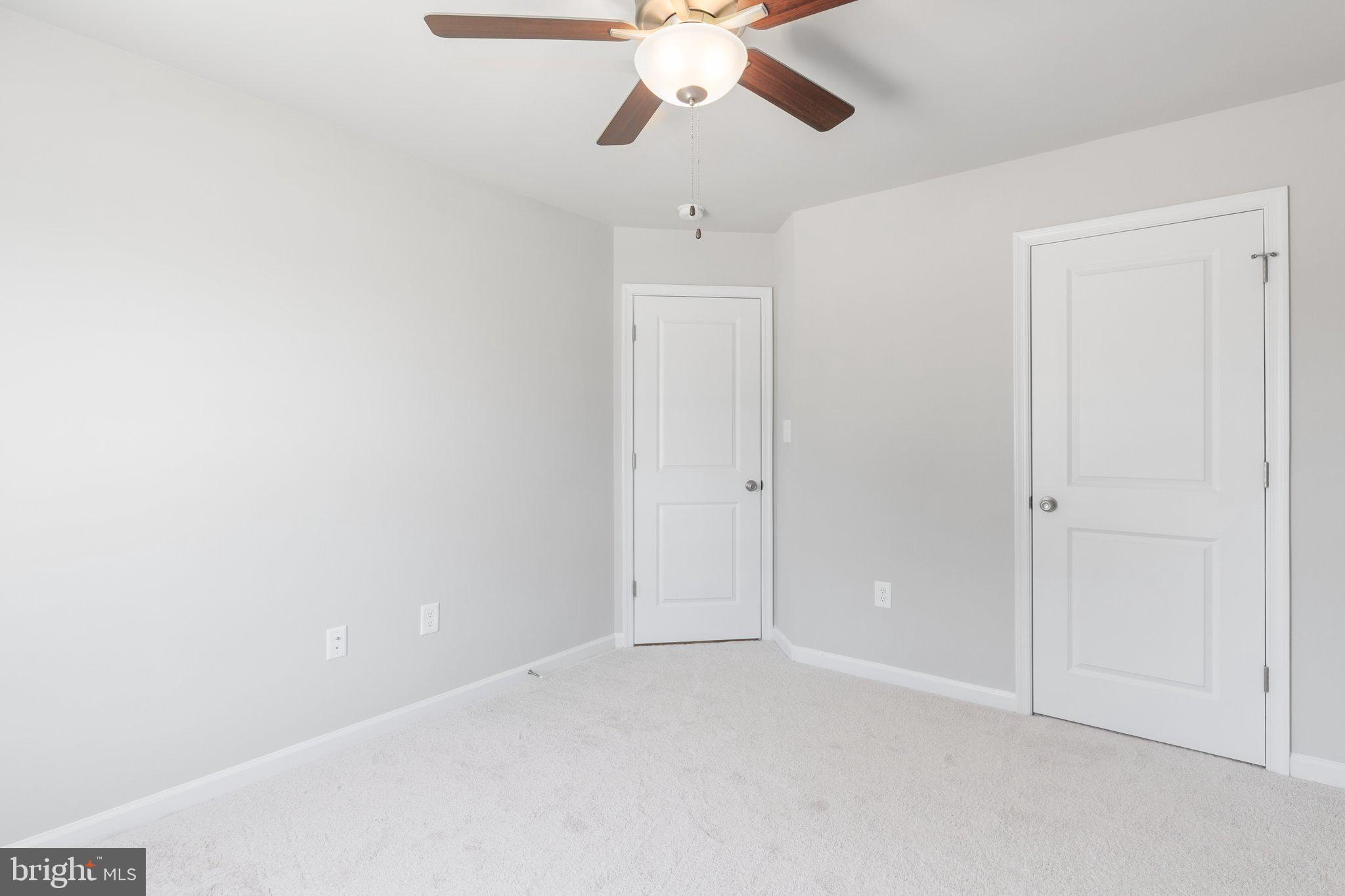 10 Azalea Way Colonial Beach, VA 22443 - Photo 17 of 36 a view of an empty room