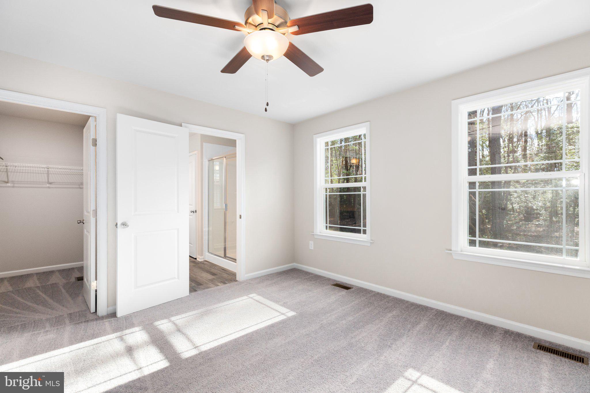 10 Azalea Way Colonial Beach, VA 22443 - Photo 25 of 36 a view of an empty room with a window