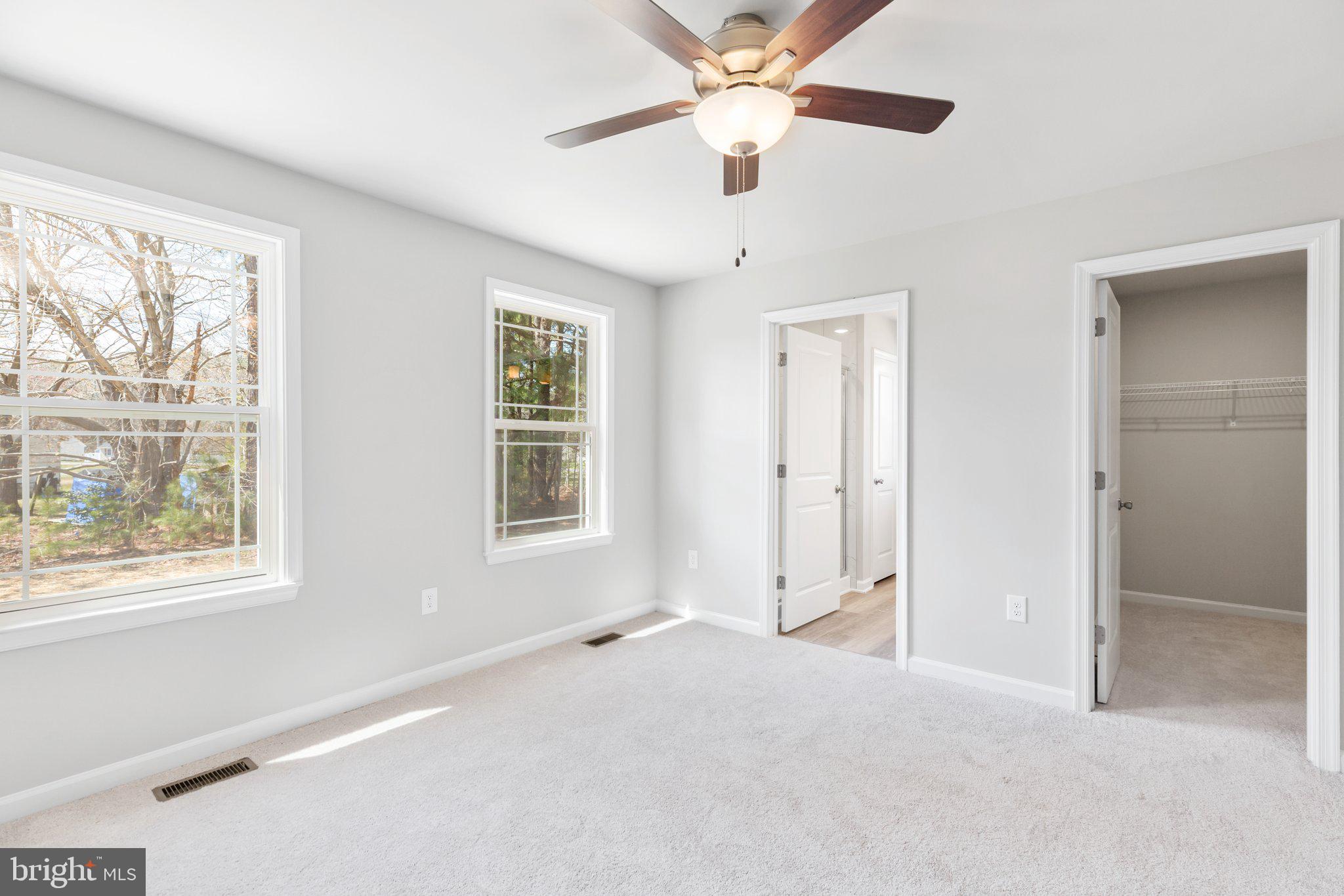 10 Azalea Way Colonial Beach, VA 22443 - Photo 8 of 36 a view of an empty room with a window