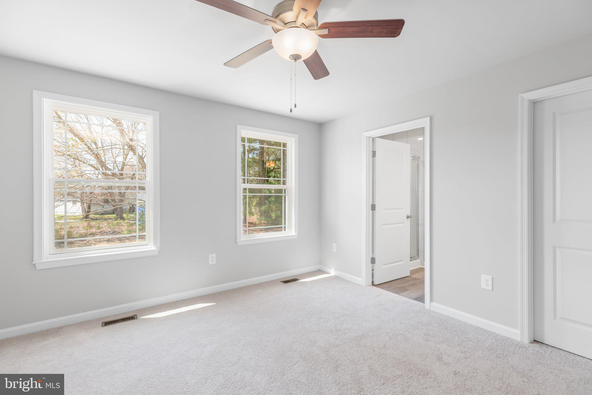 10 Azalea Way Colonial Beach, VA 22443 - Photo 9 of 36 a view of an empty room with a window