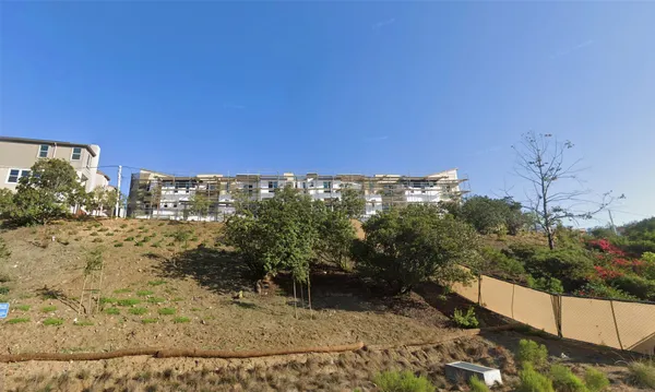 a view of a yard with an outdoor space