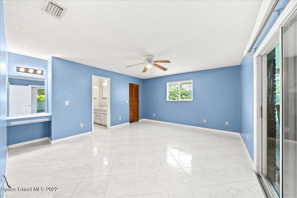 789 Rostock Circle Northwest Palm Bay, FL 32907 - Photo 16 of 34 Master Suite