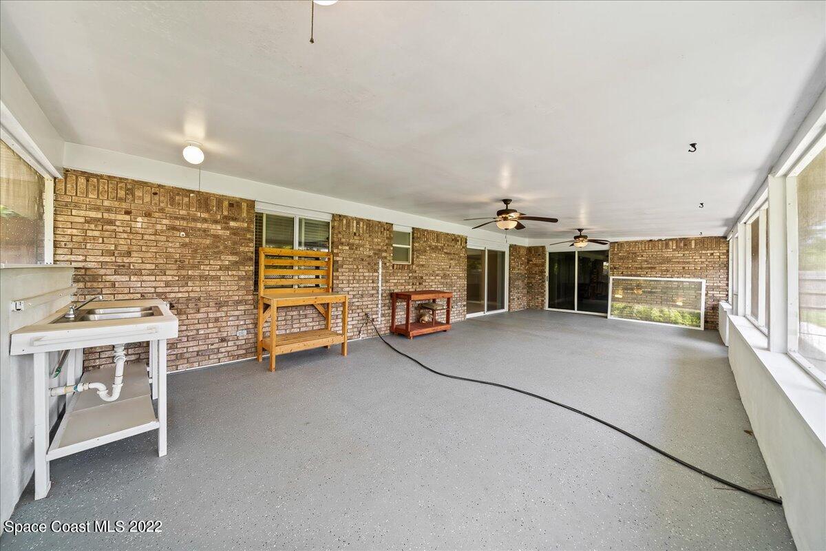 789 Rostock Circle Northwest Palm Bay, FL 32907 - Photo 24 of 34 Screened Patio