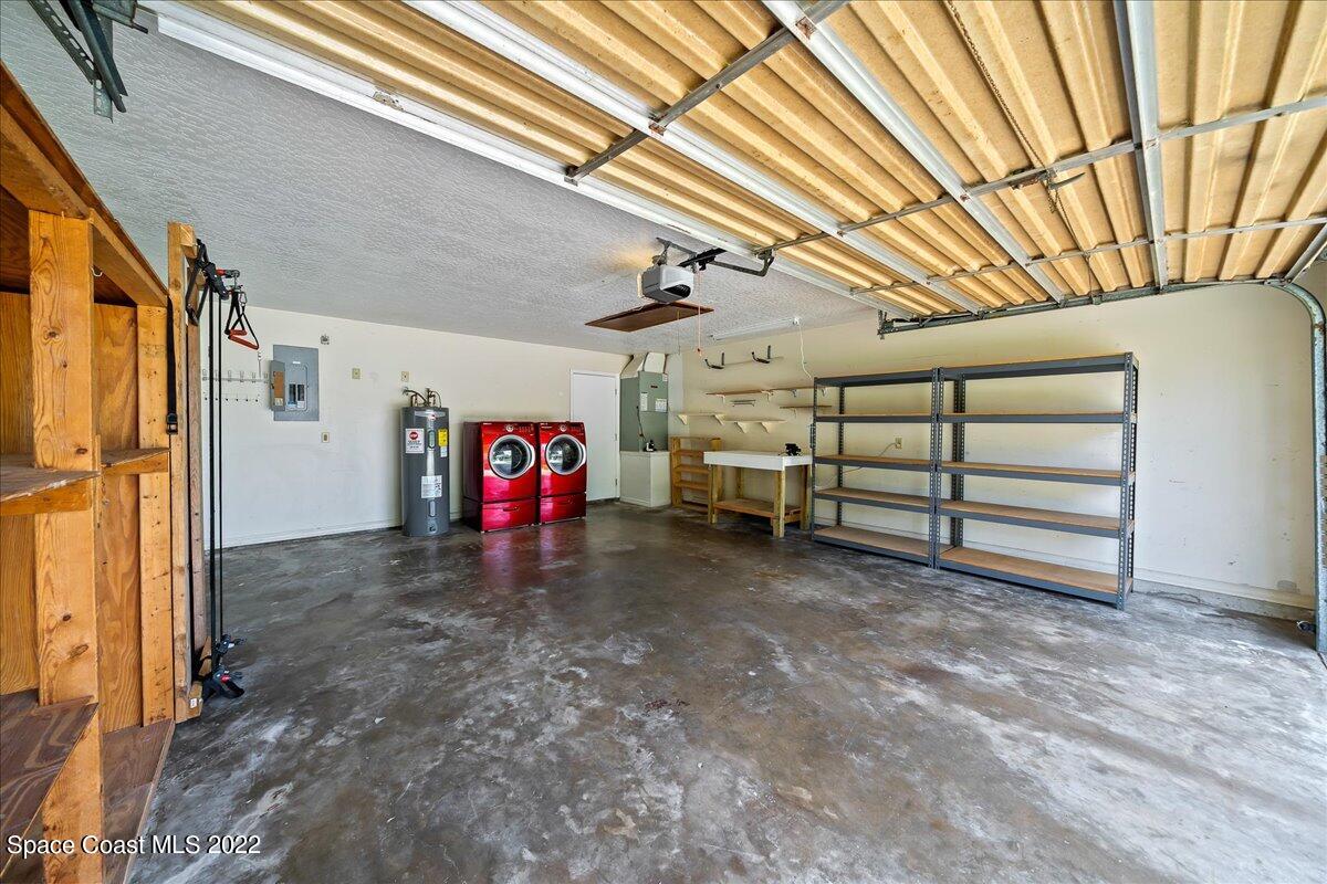 789 Rostock Circle Northwest Palm Bay, FL 32907 - Photo 27 of 34 Garage