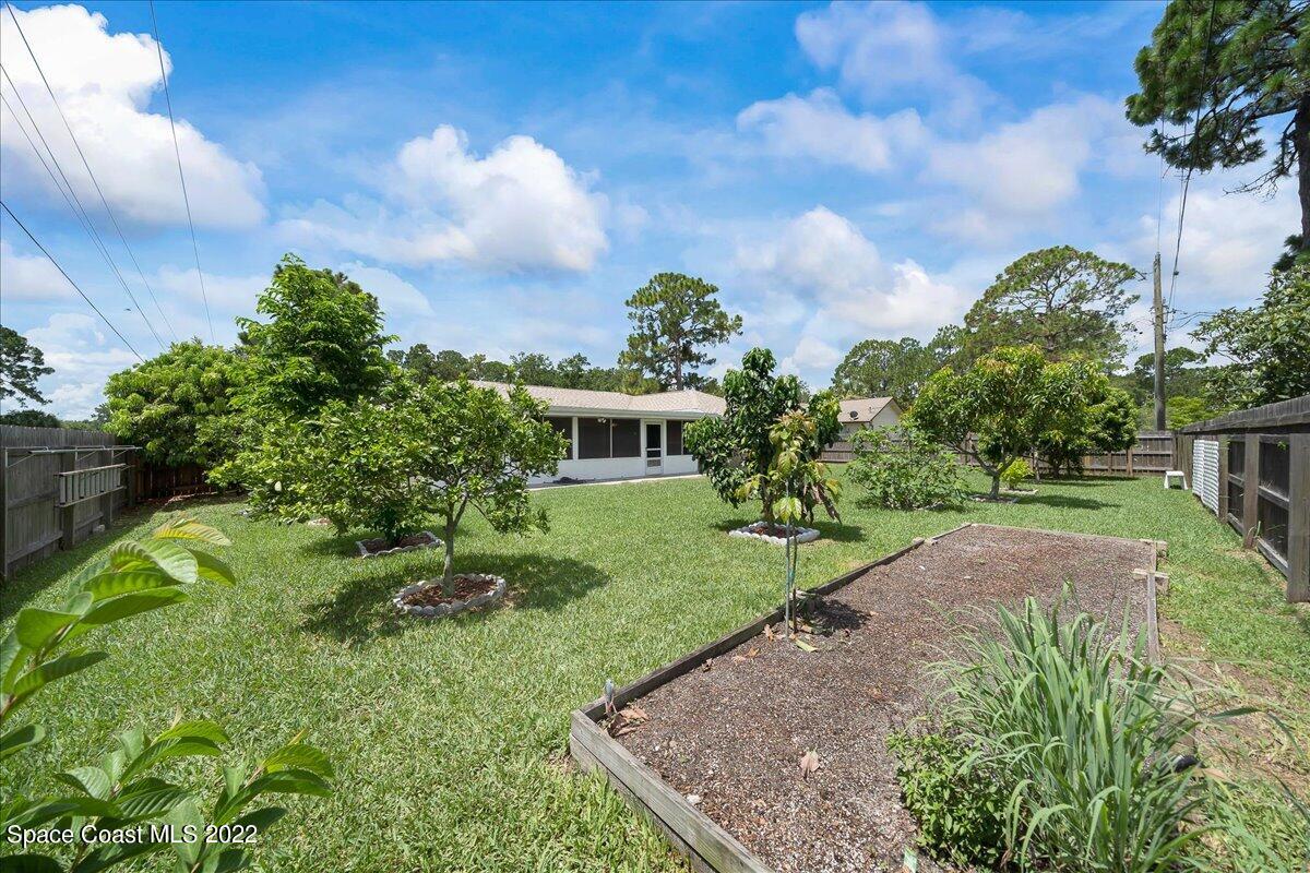 789 Rostock Circle Northwest Palm Bay, FL 32907 - Photo 3 of 34 Yard