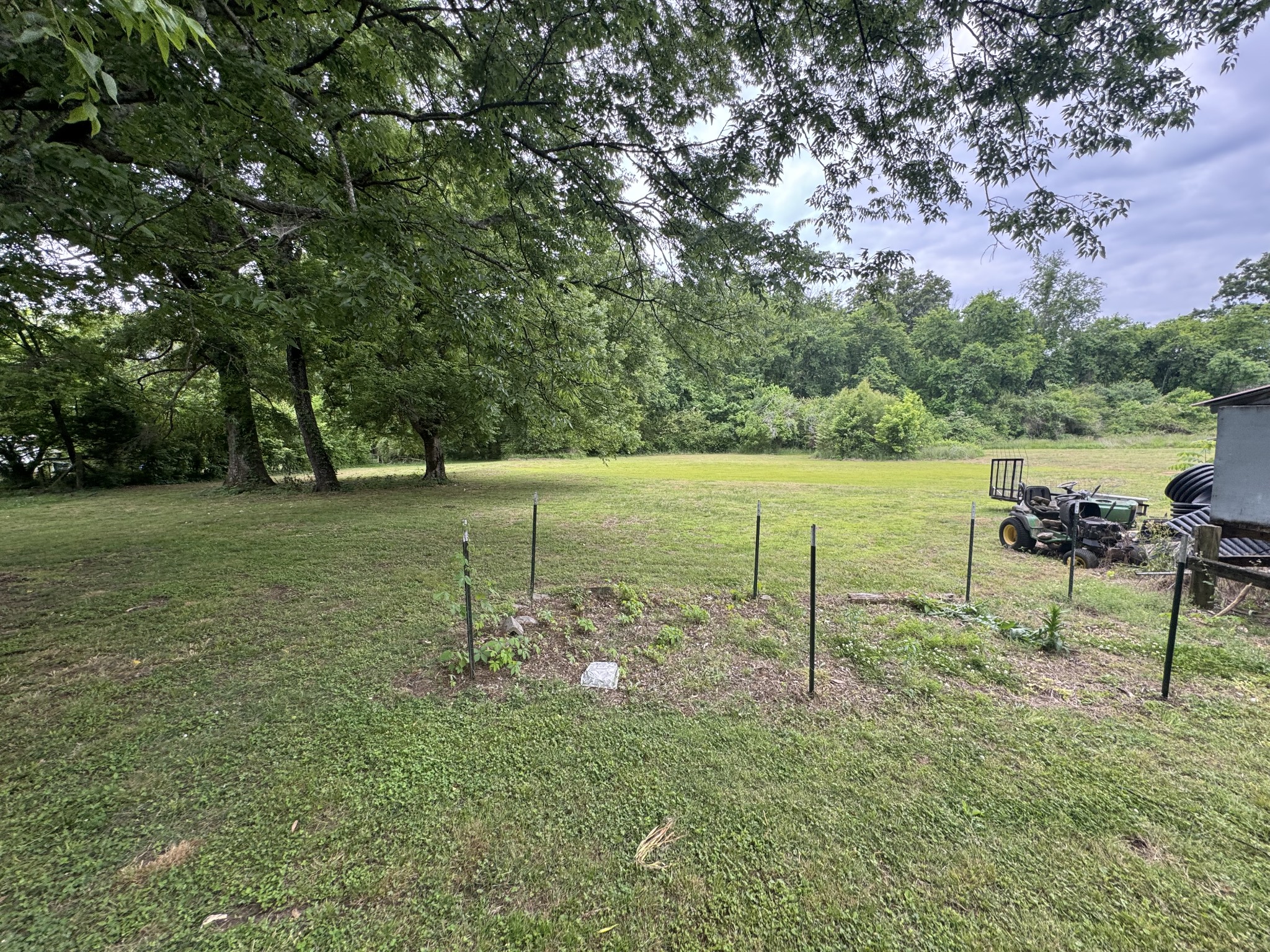 102 Sugar Tree Road Pulaski, TN 38478 - Photo 13 of 35 a view of a golf course with a bench