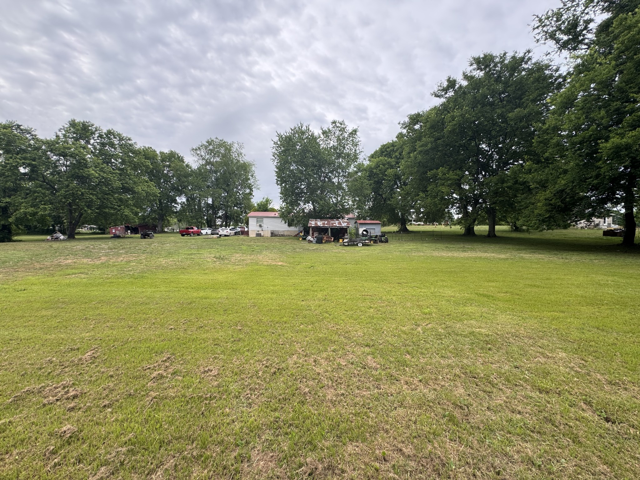 102 Sugar Tree Road Pulaski, TN 38478 - Photo 16 of 35 a view of a lake with houses in the background