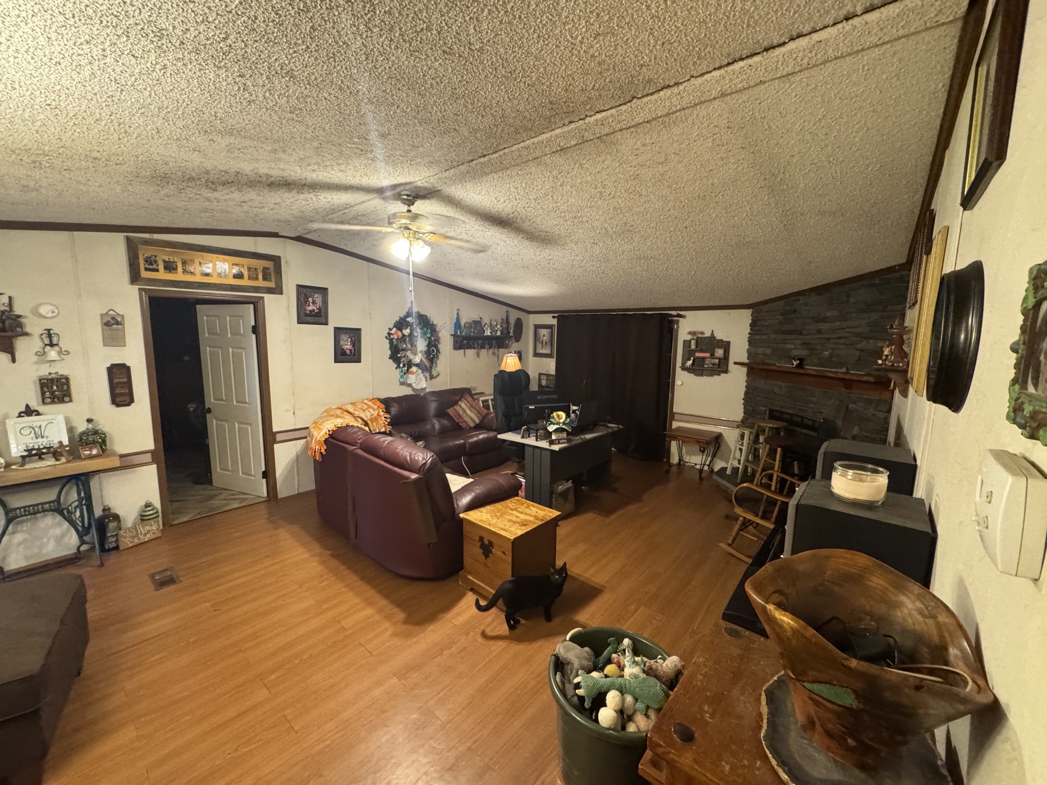 102 Sugar Tree Road Pulaski, TN 38478 - Photo 27 of 35 a living room with furniture and a flat screen tv