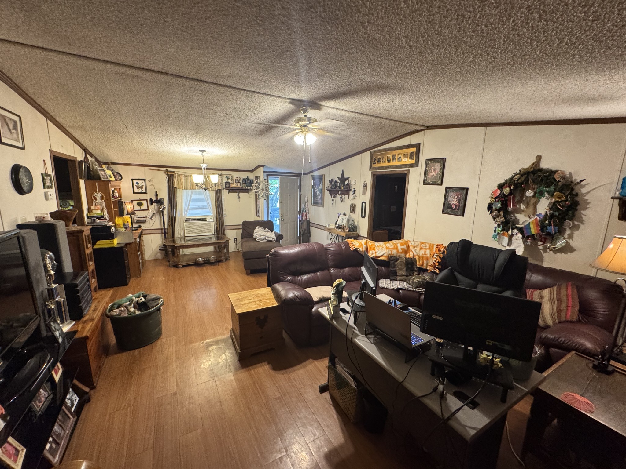 102 Sugar Tree Road Pulaski, TN 38478 - Photo 28 of 35 a living room with furniture and a flat screen tv