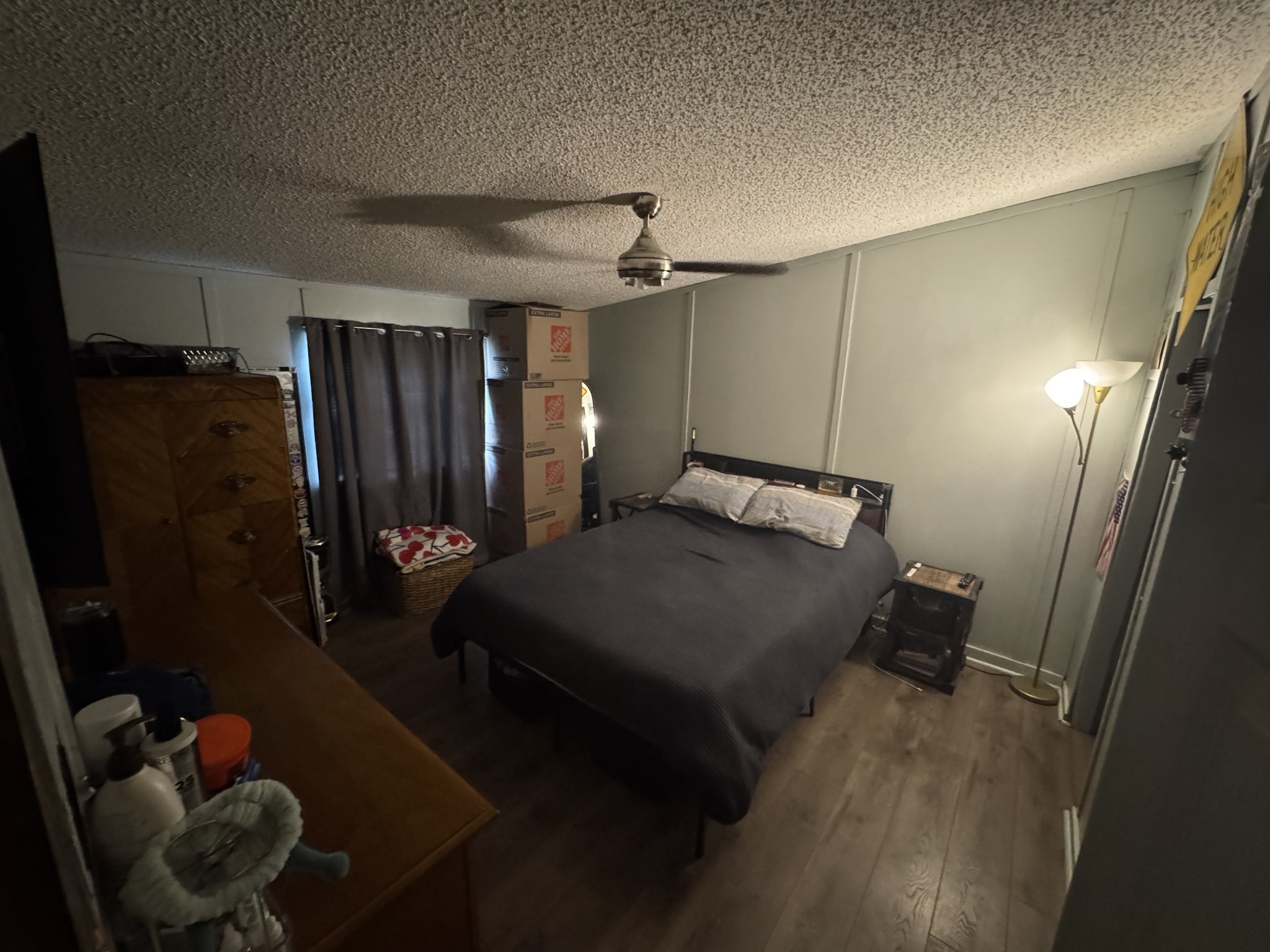 102 Sugar Tree Road Pulaski, TN 38478 - Photo 31 of 35 a bedroom with a bed and wooden floor