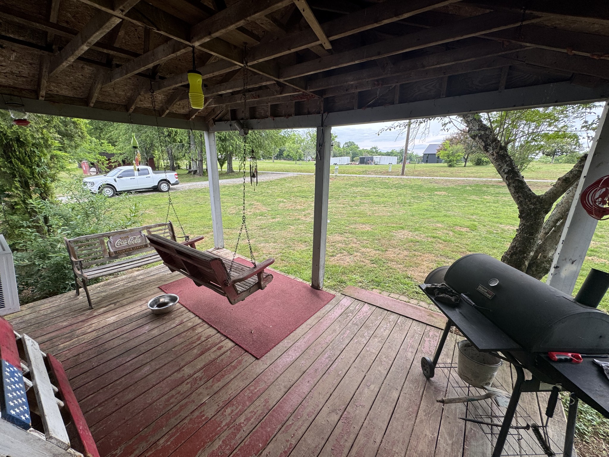 102 Sugar Tree Road Pulaski, TN 38478 - Photo 35 of 35 a view of a chairs and table in patio with a yard