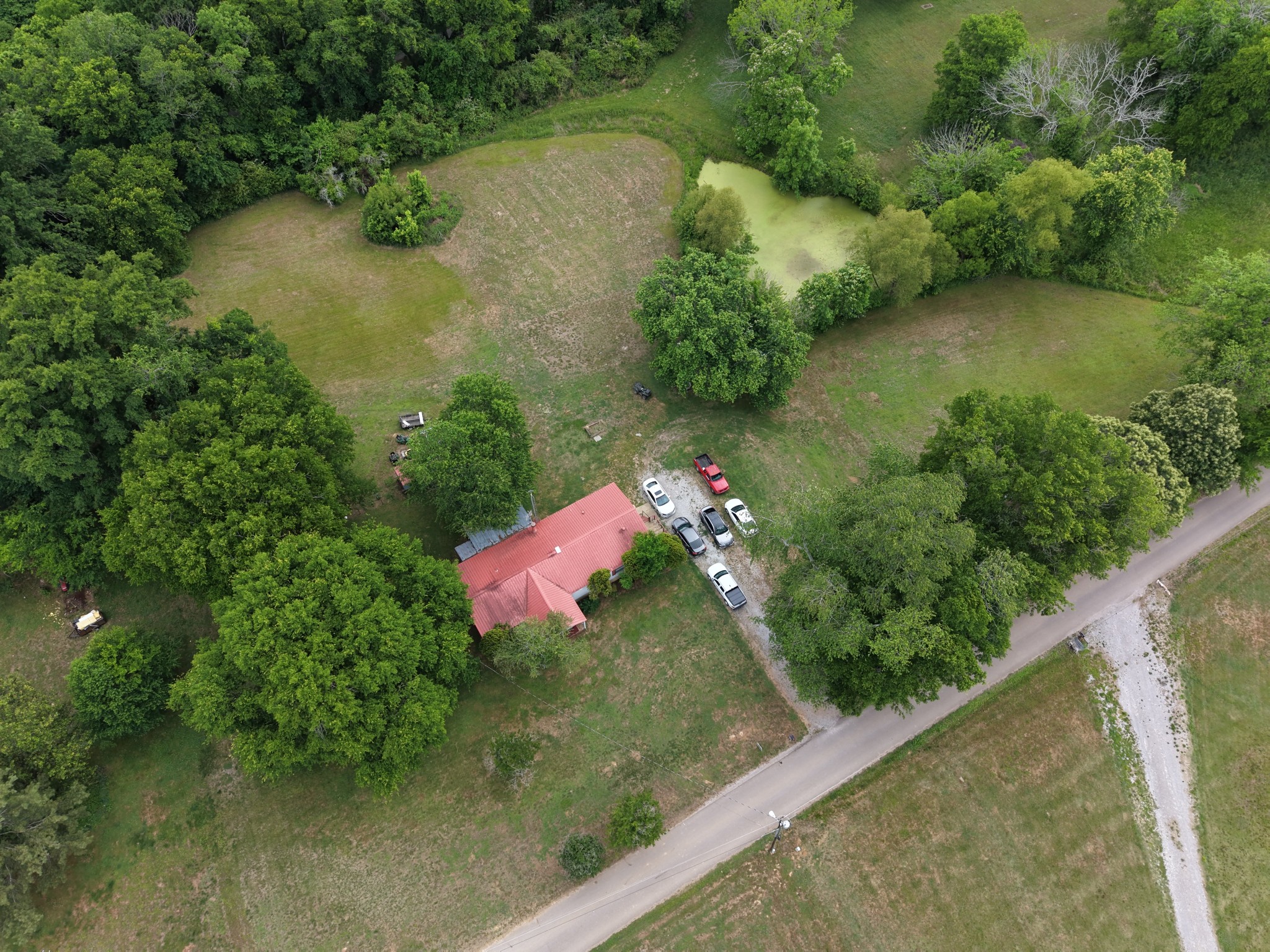 102 Sugar Tree Road Pulaski, TN 38478 - Photo 4 of 35 an aerial view of lake residential house with outdoor space and trees all around