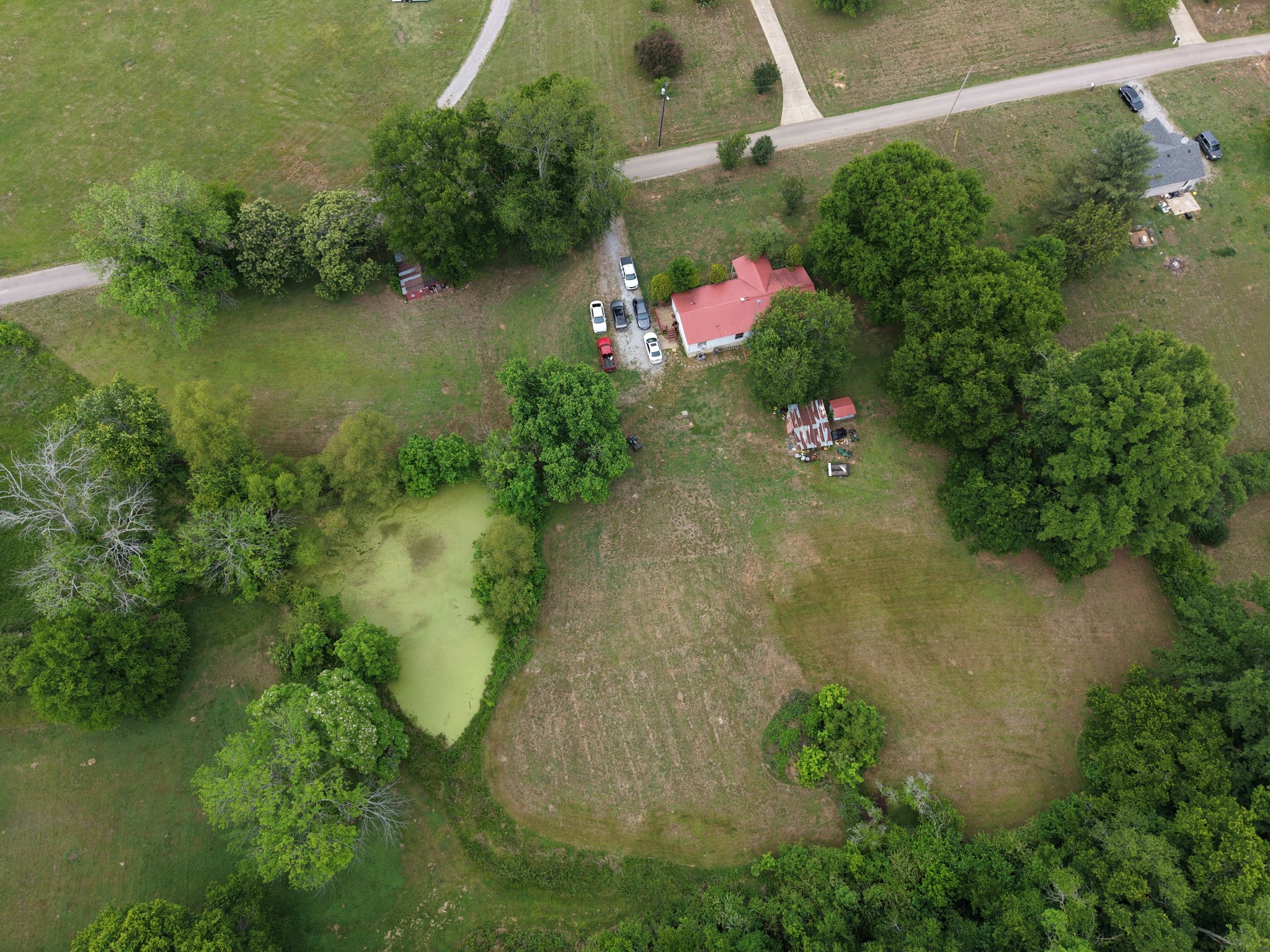 102 Sugar Tree Road Pulaski, TN 38478 - Photo 5 of 35 an aerial view of residential house with outdoor space and trees all around