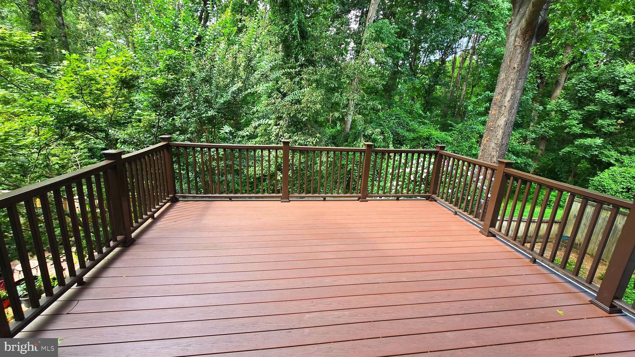 5987 Clerkenwell Court Burke, VA 22015 - Photo 12 of 41 a balcony with trees in front of it