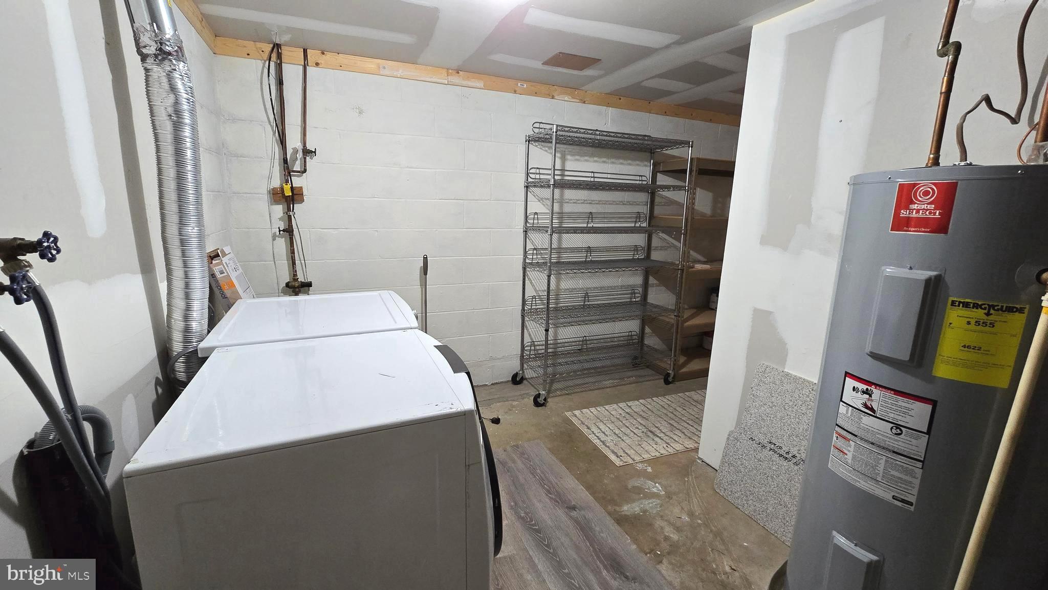 5987 Clerkenwell Court Burke, VA 22015 - Photo 39 of 41 a bathroom with a sink toilet and shower