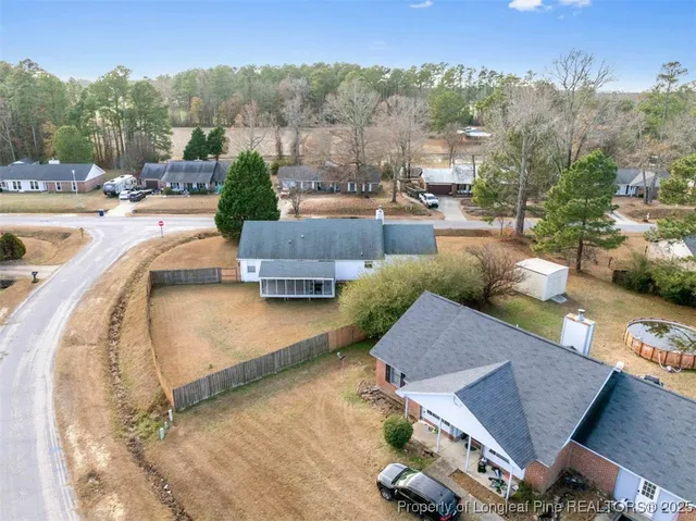 a view of a swimming pool and lounge chair