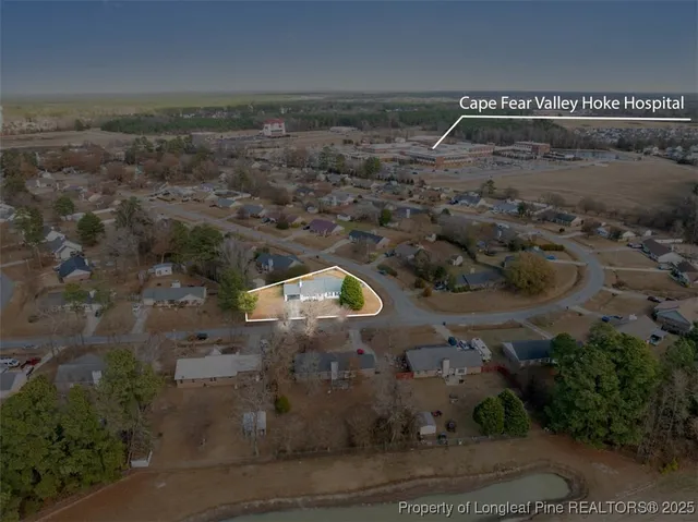 an aerial view of house with outdoor space