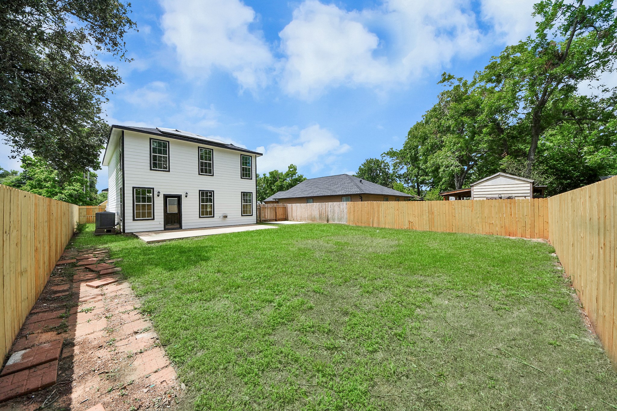 1105 East Kyle Road Clute, TX 77531 - Photo 36 of 44 Enjoy the spacious fenced backyard with it's recently installed fence. Ideal for outdoor activities and privacy.