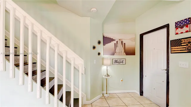 a bathroom with a shower and mirror