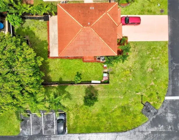 a view of a yard with an outdoor space