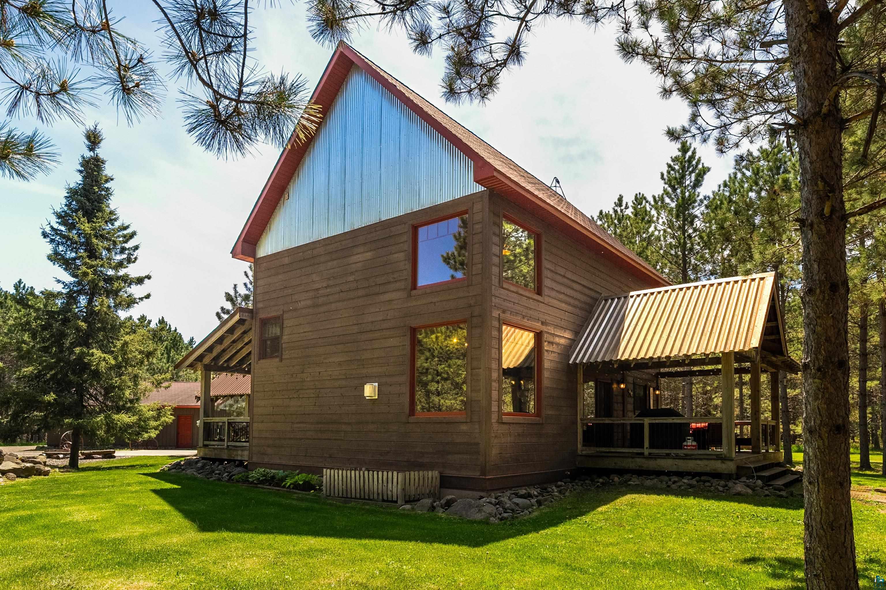 75 East Stark Road Esko, MN 55733 - Photo 60 of 87 Wood-sided structure with a light-colored gable and a pitched roof