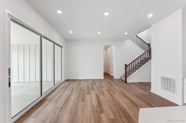 a view of entryway with wooden floor