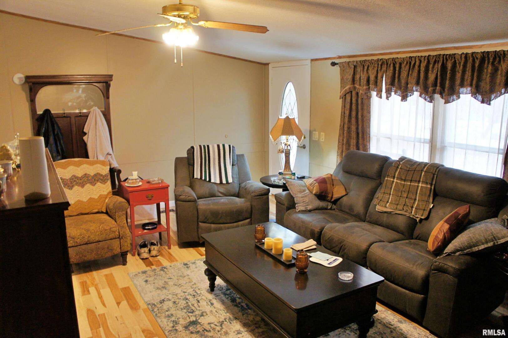6752 South US 45 Road Brookport, IL 62910 - Photo 47 of 62 a living room with furniture and a large window