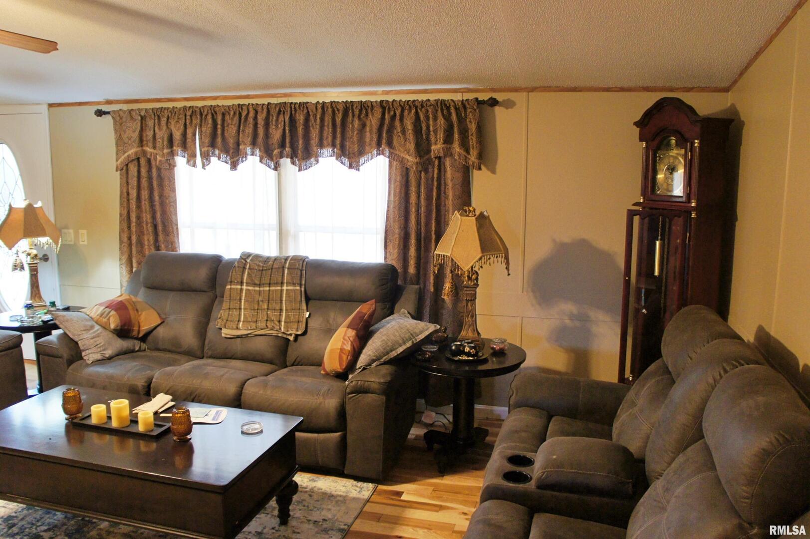 6752 South US 45 Road Brookport, IL 62910 - Photo 48 of 62 a living room with furniture and a large window