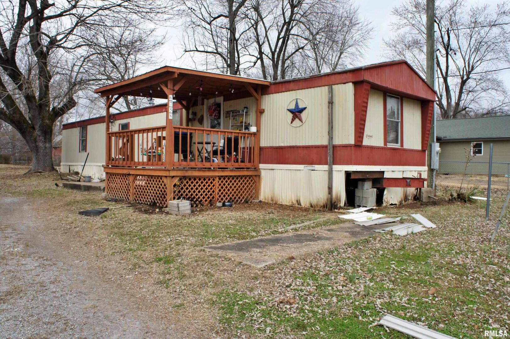 6752 South US 45 Road Brookport, IL 62910 - Photo 59 of 62 a front view of a house with a yard