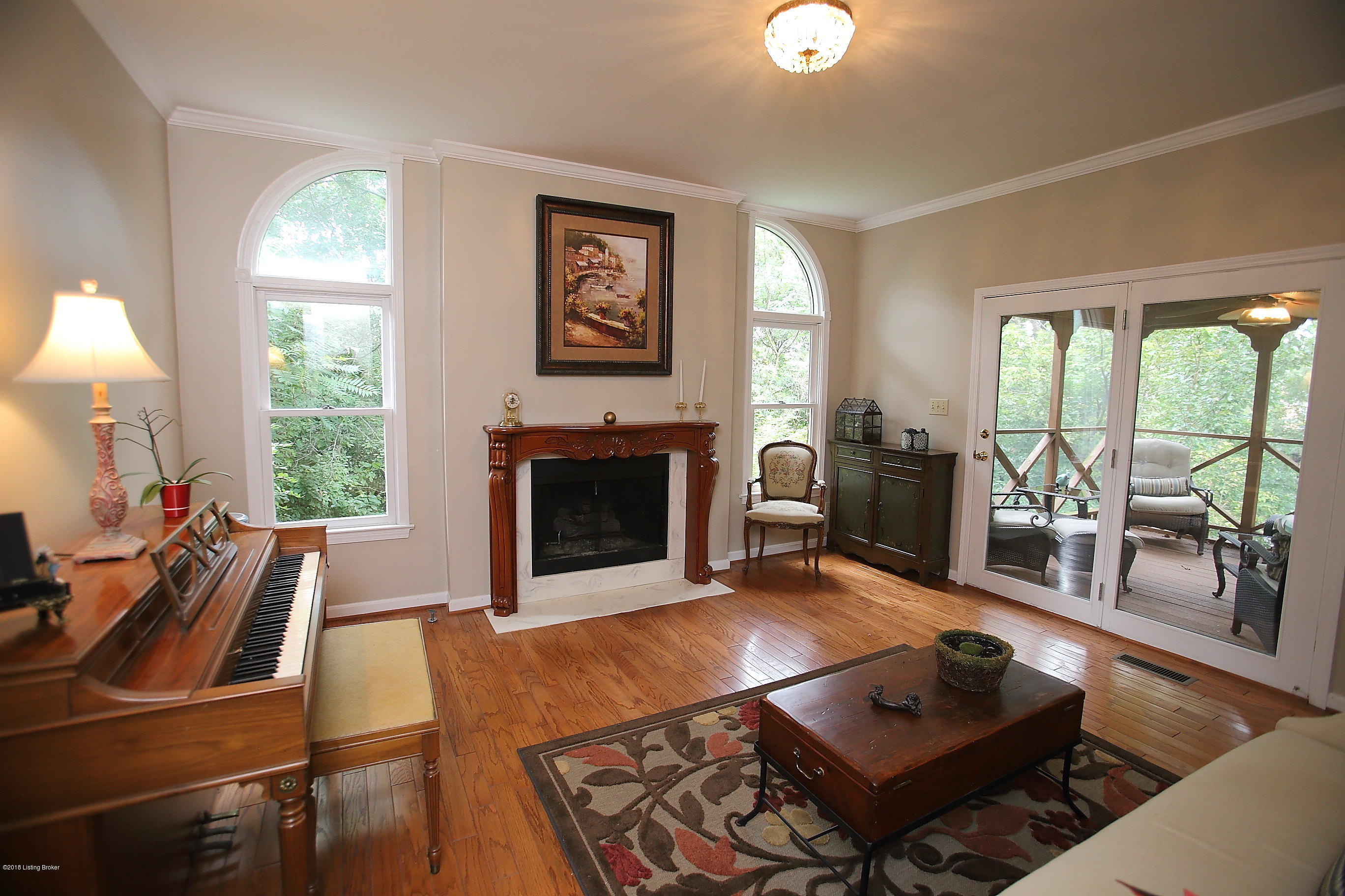 11802 Lakestone Way Prospect, KY 40059 - Photo 20 of 74 Living room/den with beautiful mantle leads to screened porch.