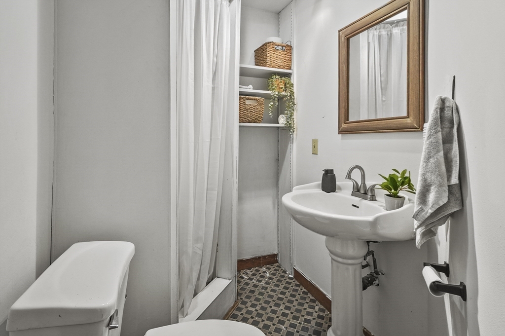 77 Vinton Road Holland, MA 01521 - Photo 14 of 31 a bathroom with a sink a toilet and shower