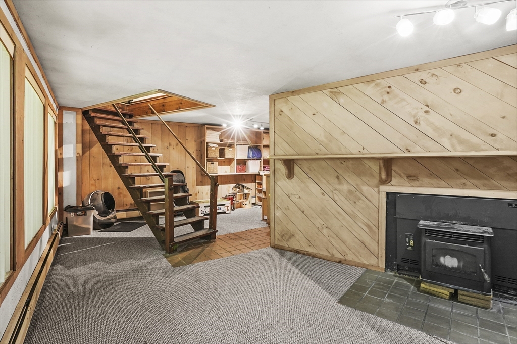 77 Vinton Road Holland, MA 01521 - Photo 15 of 31 a view of a room with wooden floor and furniture