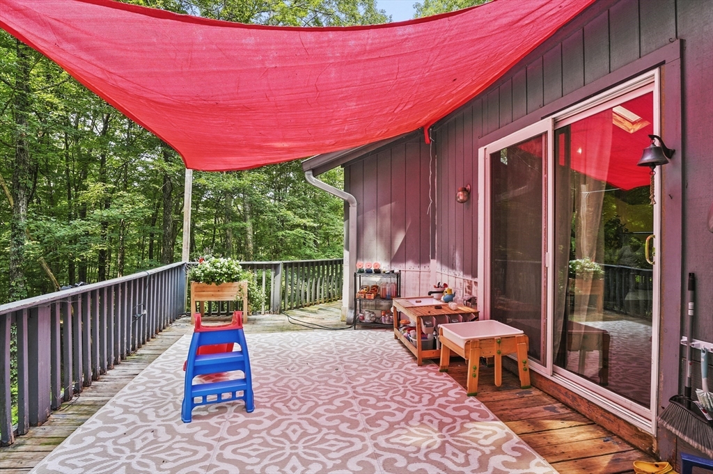 77 Vinton Road Holland, MA 01521 - Photo 24 of 31 a view of swimming pool with a patio