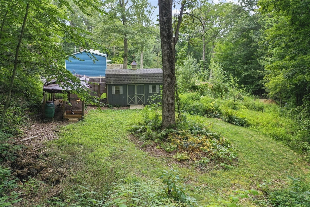 77 Vinton Road Holland, MA 01521 - Photo 31 of 31 a view of house with yard and furniture
