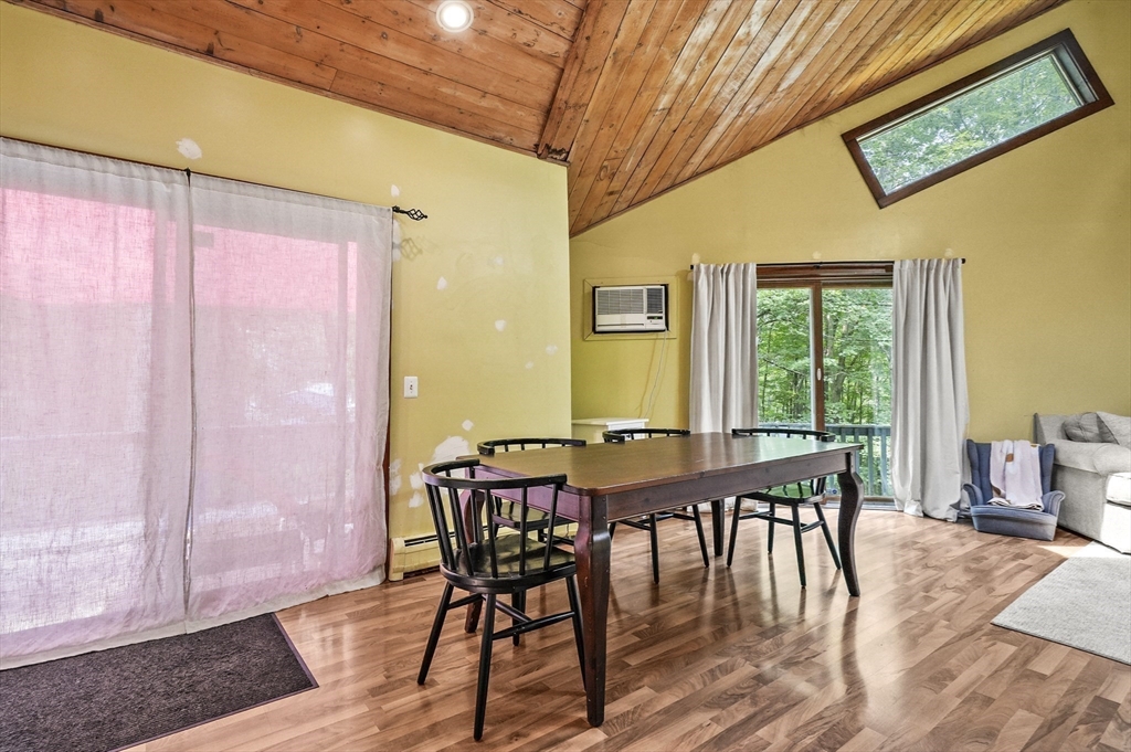 77 Vinton Road Holland, MA 01521 - Photo 6 of 31 a view of a dining room with furniture window and wooden floor