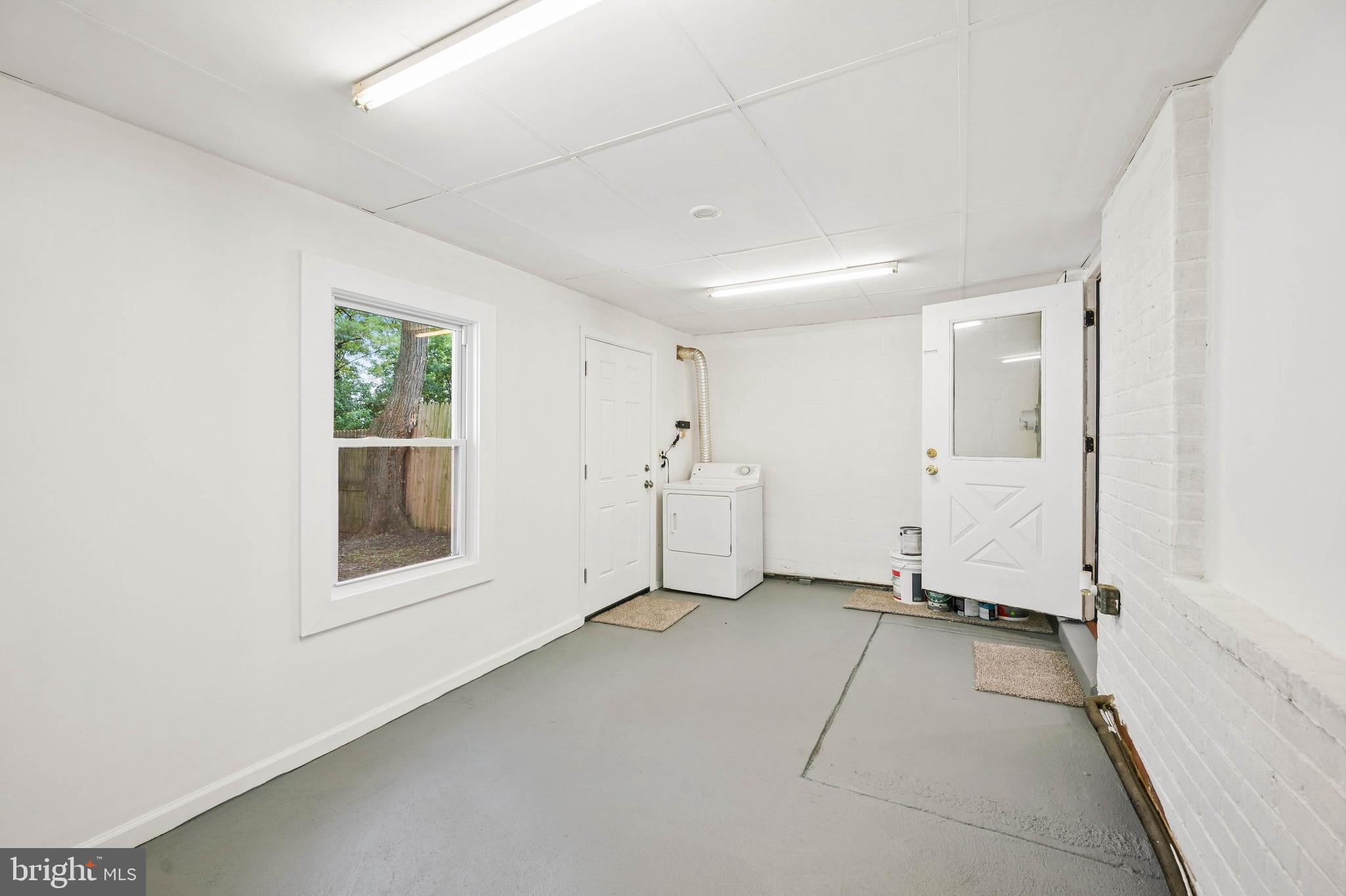 7227 Sindall Road Baltimore, MD 21234 - Photo 26 of 62 an empty room with windows