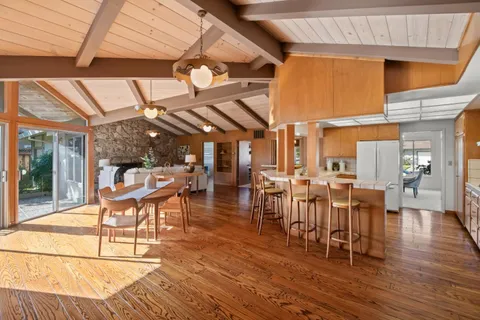 a patio with table and chairs