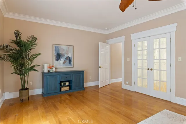 a kitchen with white cabinets and a sink