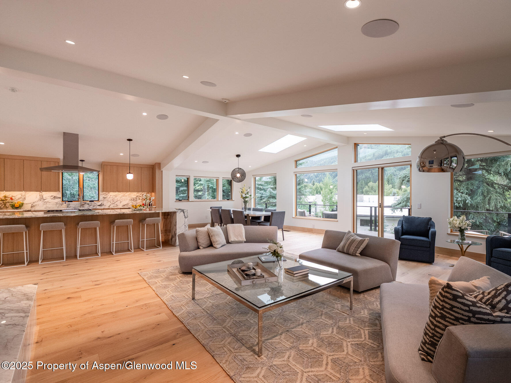 51 Roaring Fork Drive Aspen, CO 81611 - Photo 11 of 30 a living room with furniture and a table